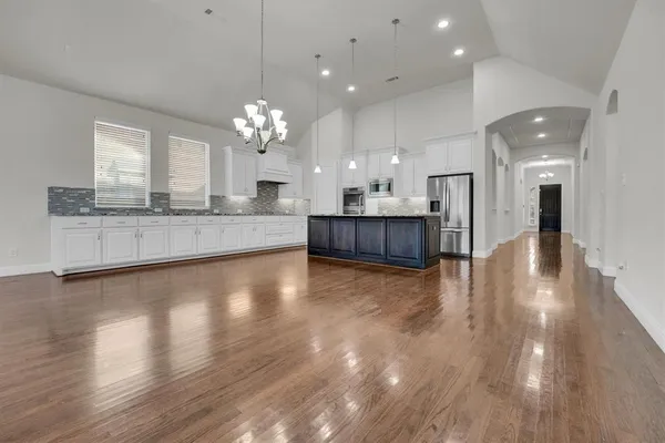 a living room with furniture fireplace and window