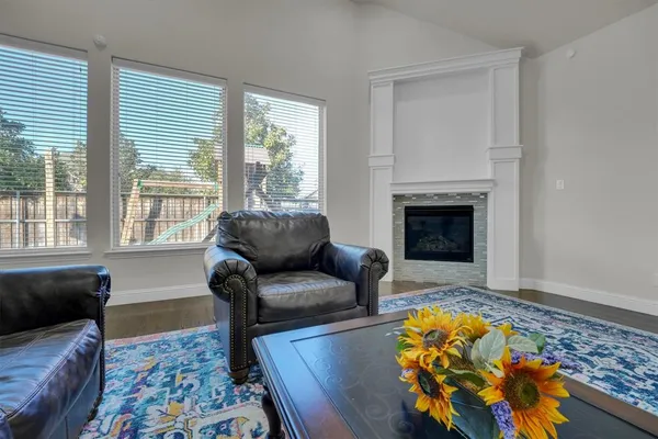 a bedroom with a bed and ceiling fan