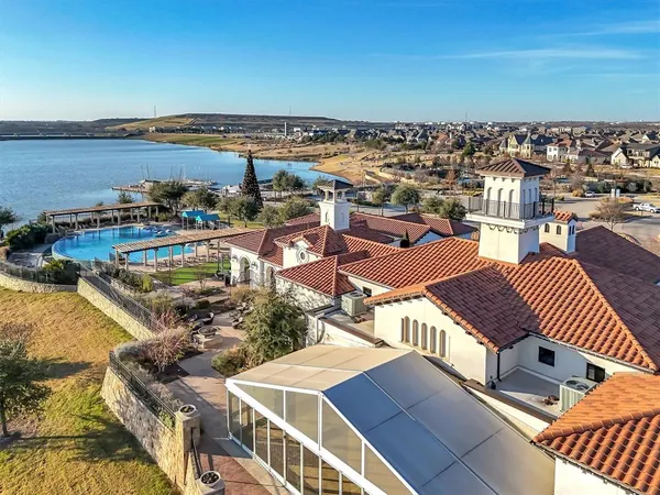 a view of a swimming pool with an ocean view