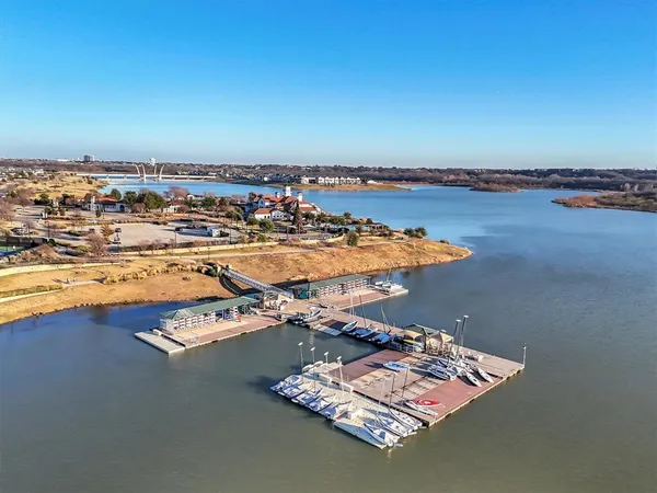 a view of a swimming pool with an outdoor seating