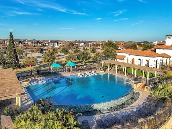 a very nice looking hallway with wooden floor