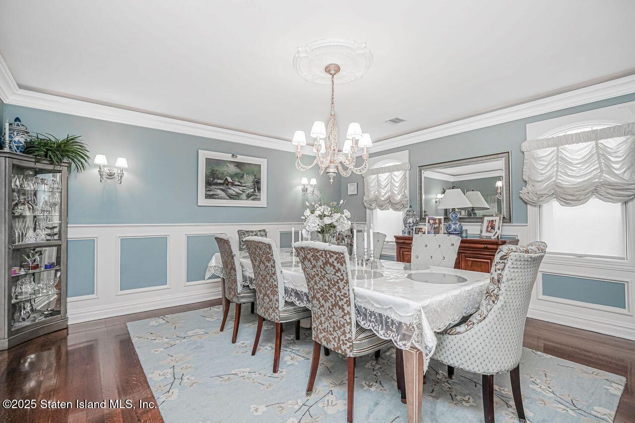 63 Finlay Avenue Staten Island, NY 10309 - Photo 10 of 45 a view of a dining room with furniture and window