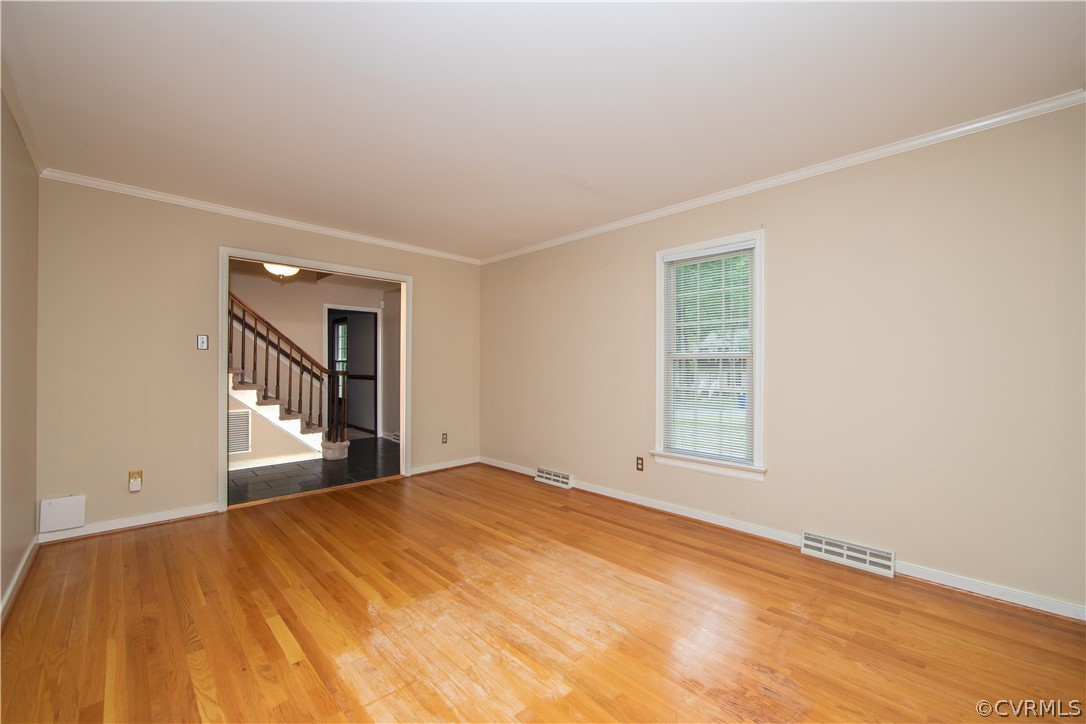 4325 Brixton Road Chesterfield, VA 23832 - Photo 2 of 19 The formal living room features wood floors and cr