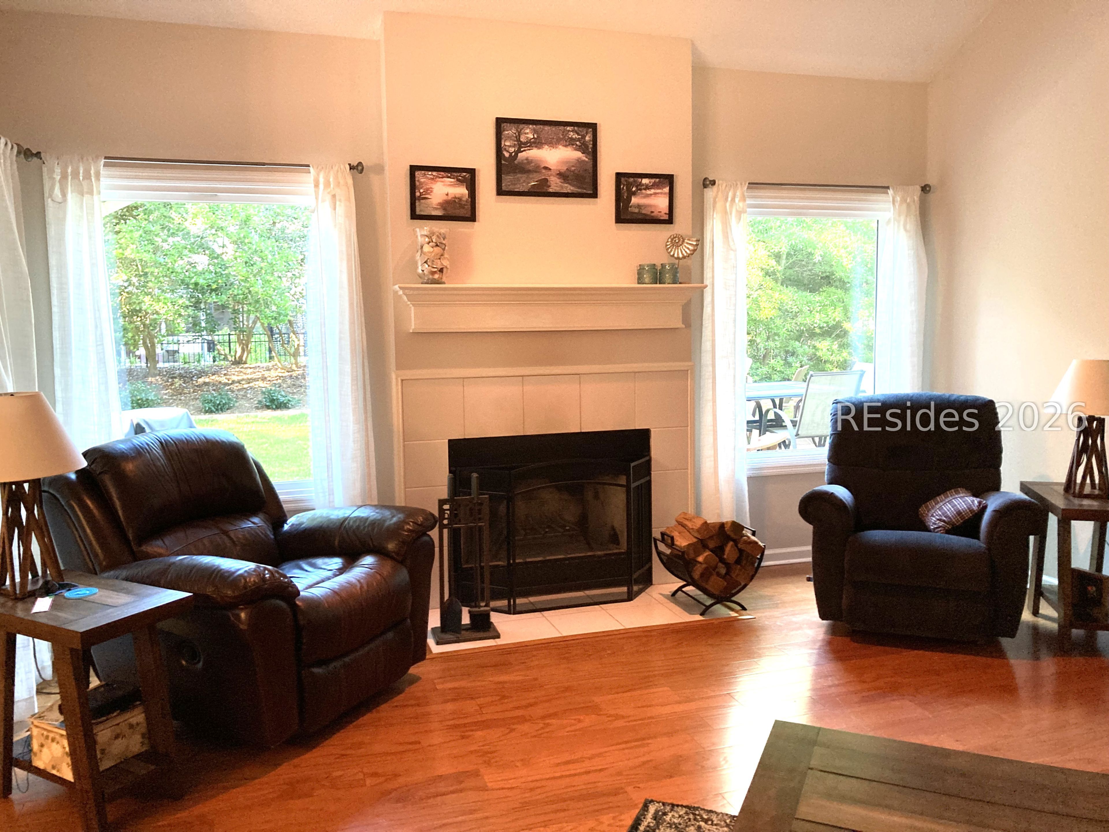 3 Crabtree Lane Bluffton, SC 29910 - Photo 5 of 56 Wood burning fireplace w/ new windows