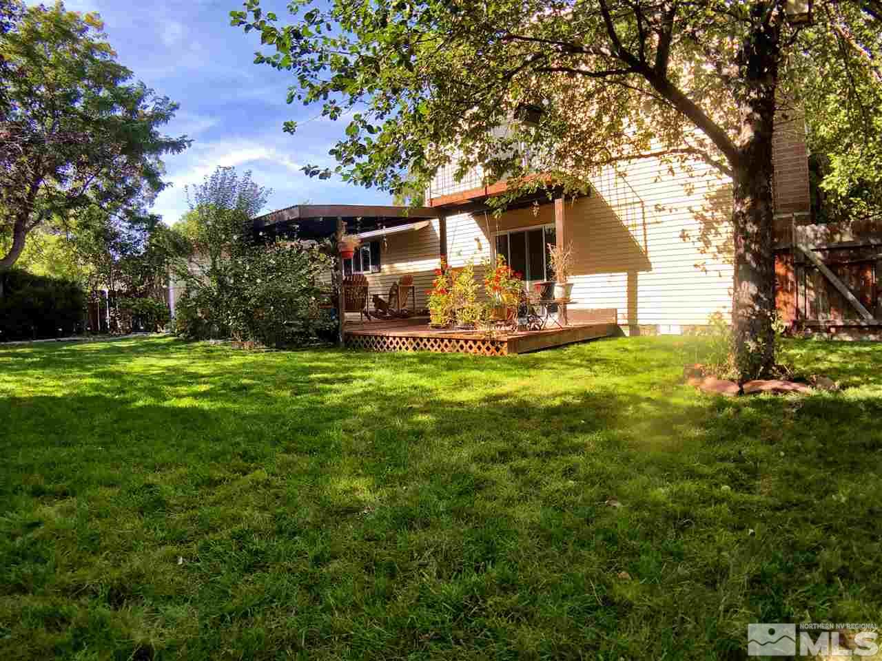 4210 Billy Drive Reno, NV 89502 - Photo 2 of 31 a front view of a house with yard and green space