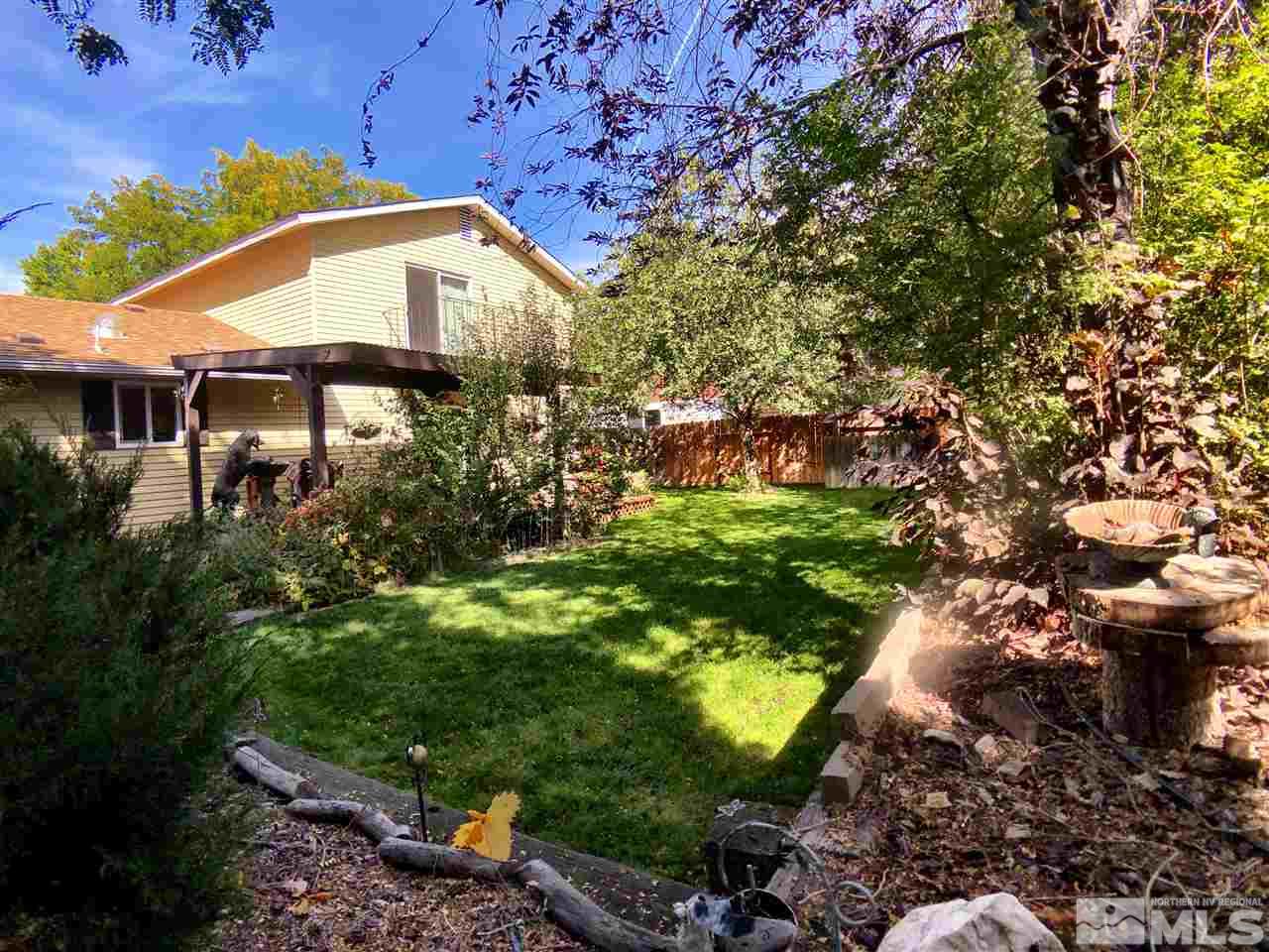 4210 Billy Drive Reno, NV 89502 - Photo 7 of 31 a backyard of a house with lots of green space