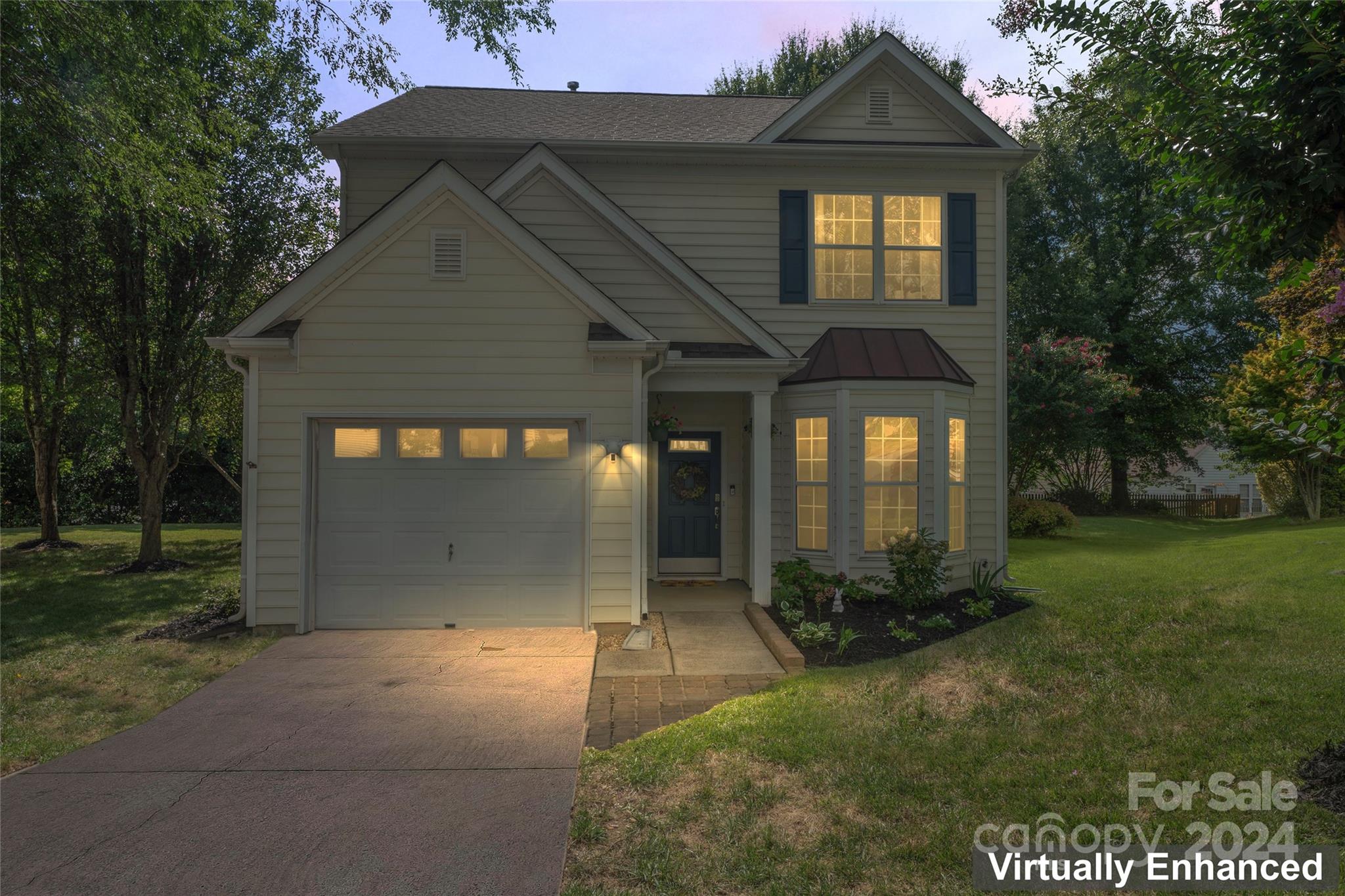 3144 Tanzanite Circle Fort Mill, SC 29708 - Photo 1 of 38 a front view of a house with garden