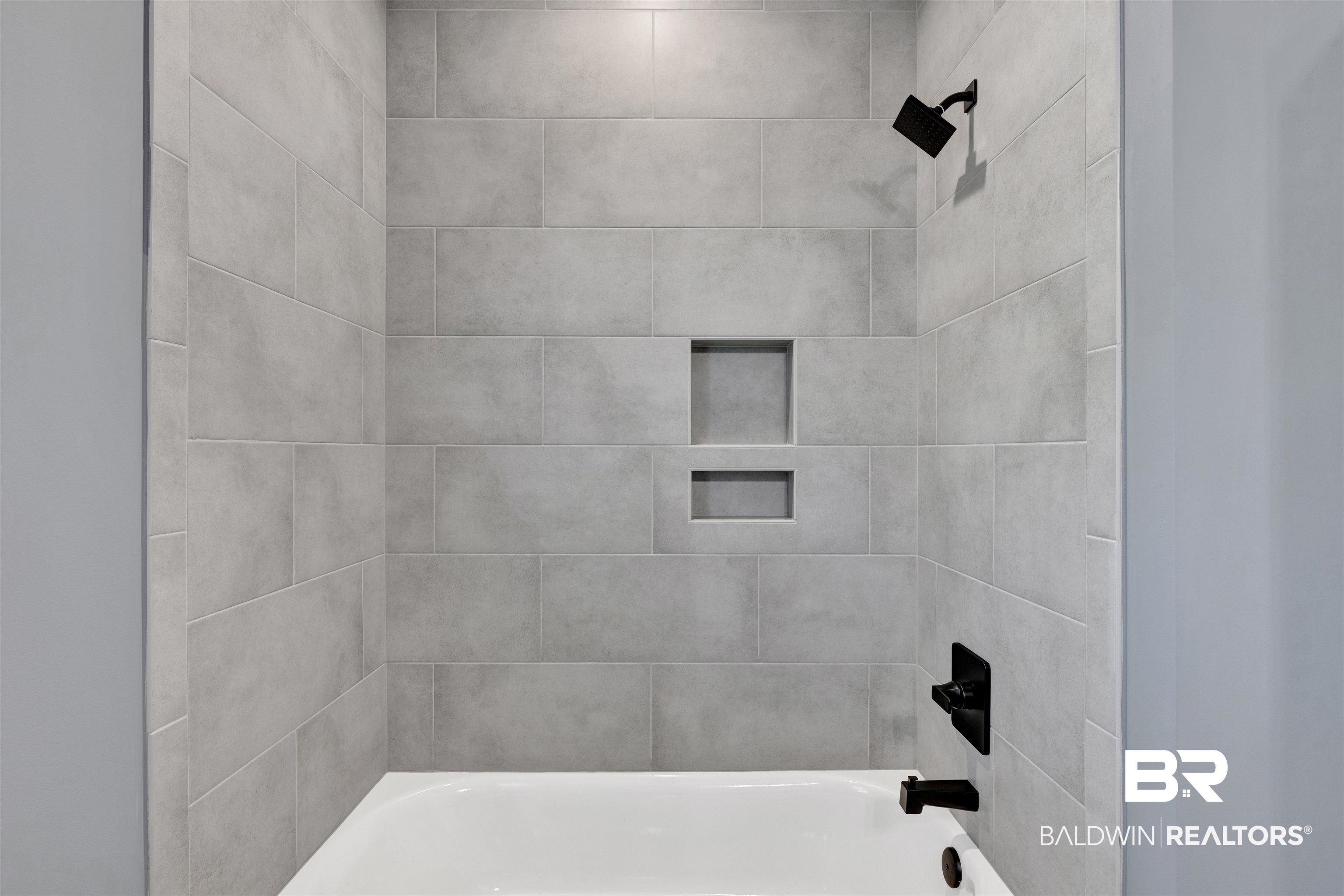 27371 Patch Pl Loop Daphne, AL 36526 - Photo 59 of 63 White bathtub with matte black fixtures