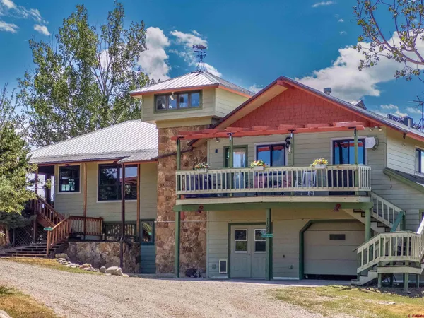 a view of a cafe with sitting area