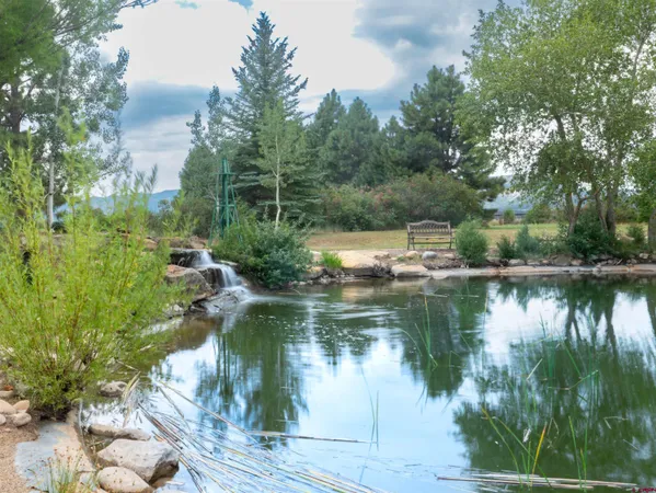 a view of a lake with a yard