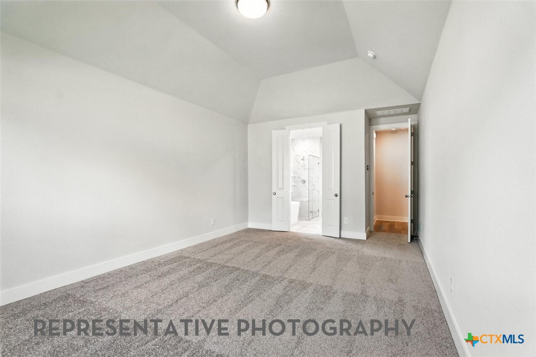 8905 Turaco Trail Austin, TX 78744 - Photo 11 of 27 a view of an empty room