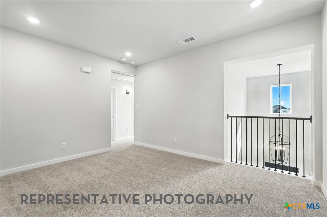 8905 Turaco Trail Austin, TX 78744 - Photo 19 of 27 a view of a hallway