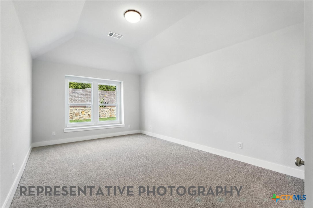 8905 Turaco Trail Austin, TX 78744 - Photo 10 of 27 an empty room with window