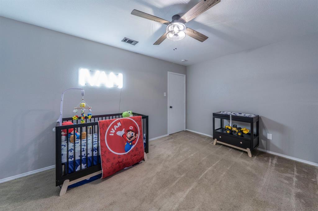 133 Adams Avenue Venus, TX 76084 - Photo 30 of 40 a living room with furniture