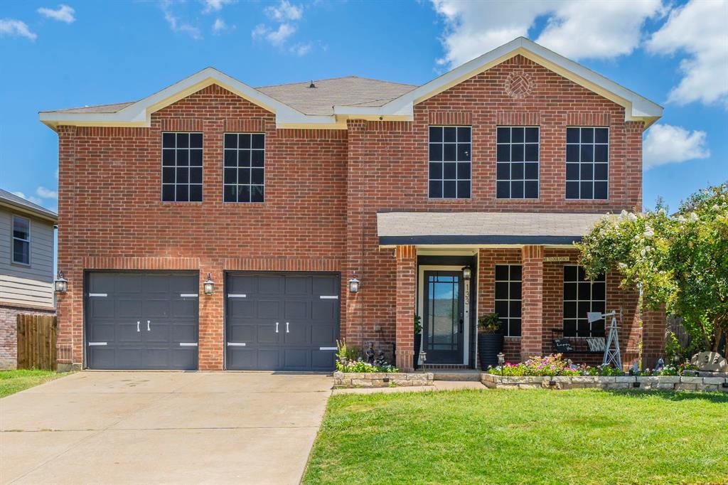 133 Adams Avenue Venus, TX 76084 - Photo 33 of 40 a front view of a house with a yard and trees