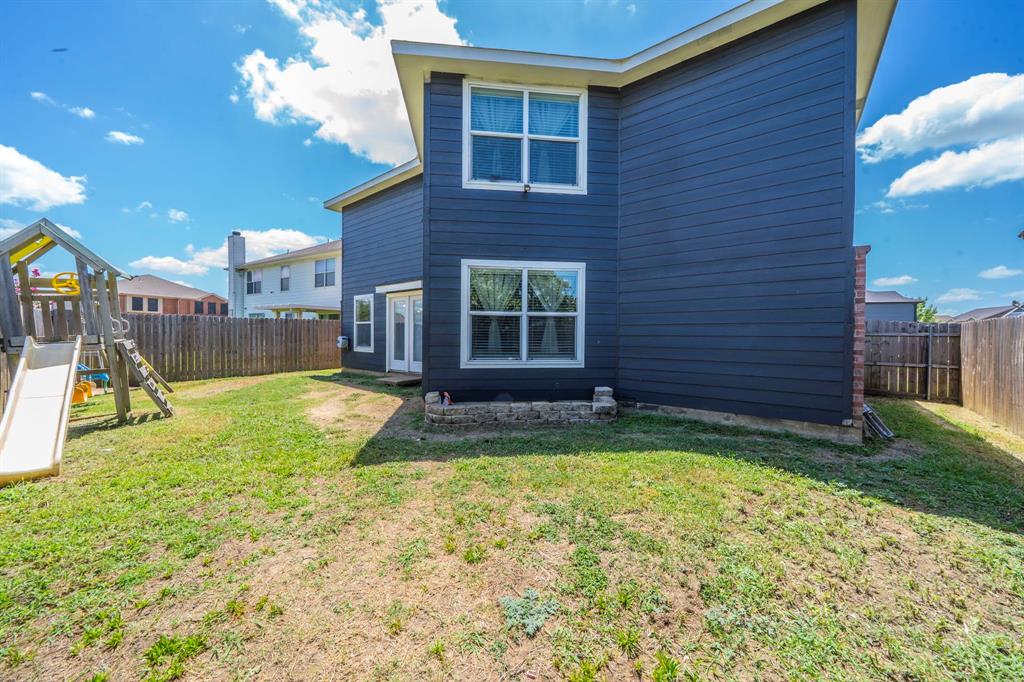 133 Adams Avenue Venus, TX 76084 - Photo 38 of 40 a view of a house with a swimming pool