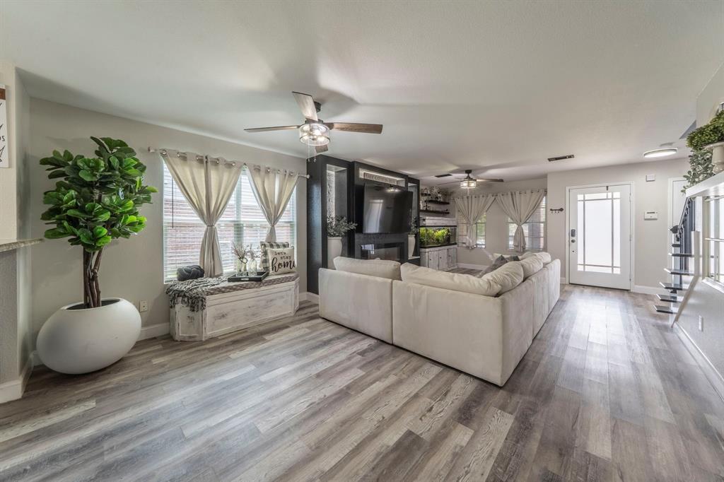 133 Adams Avenue Venus, TX 76084 - Photo 5 of 40 a living room with furniture and a large window