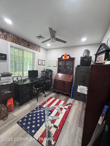 a bathroom with a sink toilet and mirror