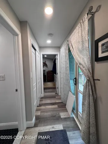 a view of house with backyard and garden