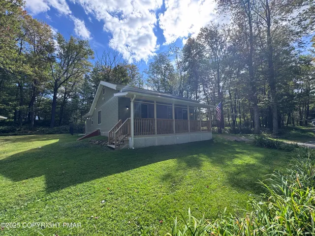 a view of a backyard with a garden