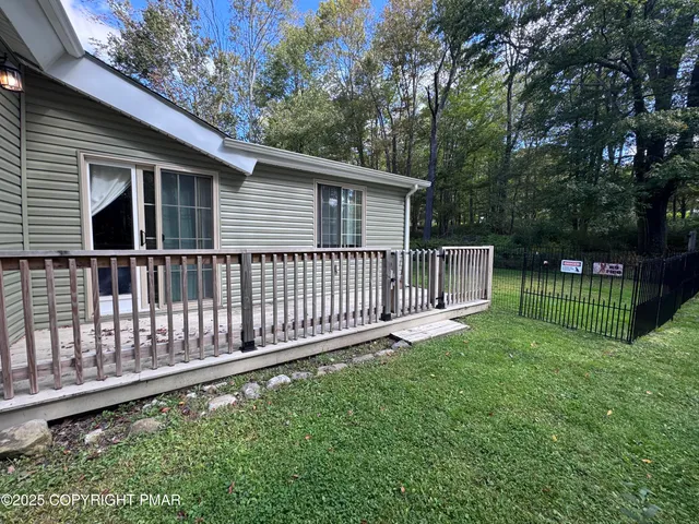 a kitchen with a table and chairs in it