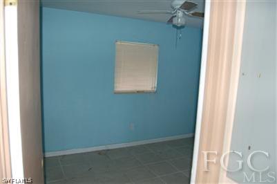 14 Arkansas Road Lehigh Acres, FL 33936 - Photo 4 of 7 a small space with a window