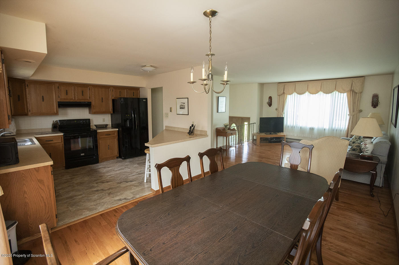 1420 Charles Road Lake Ariel, PA 18436 - Photo 11 of 47 a view of a dining room with furniture window and wooden floor