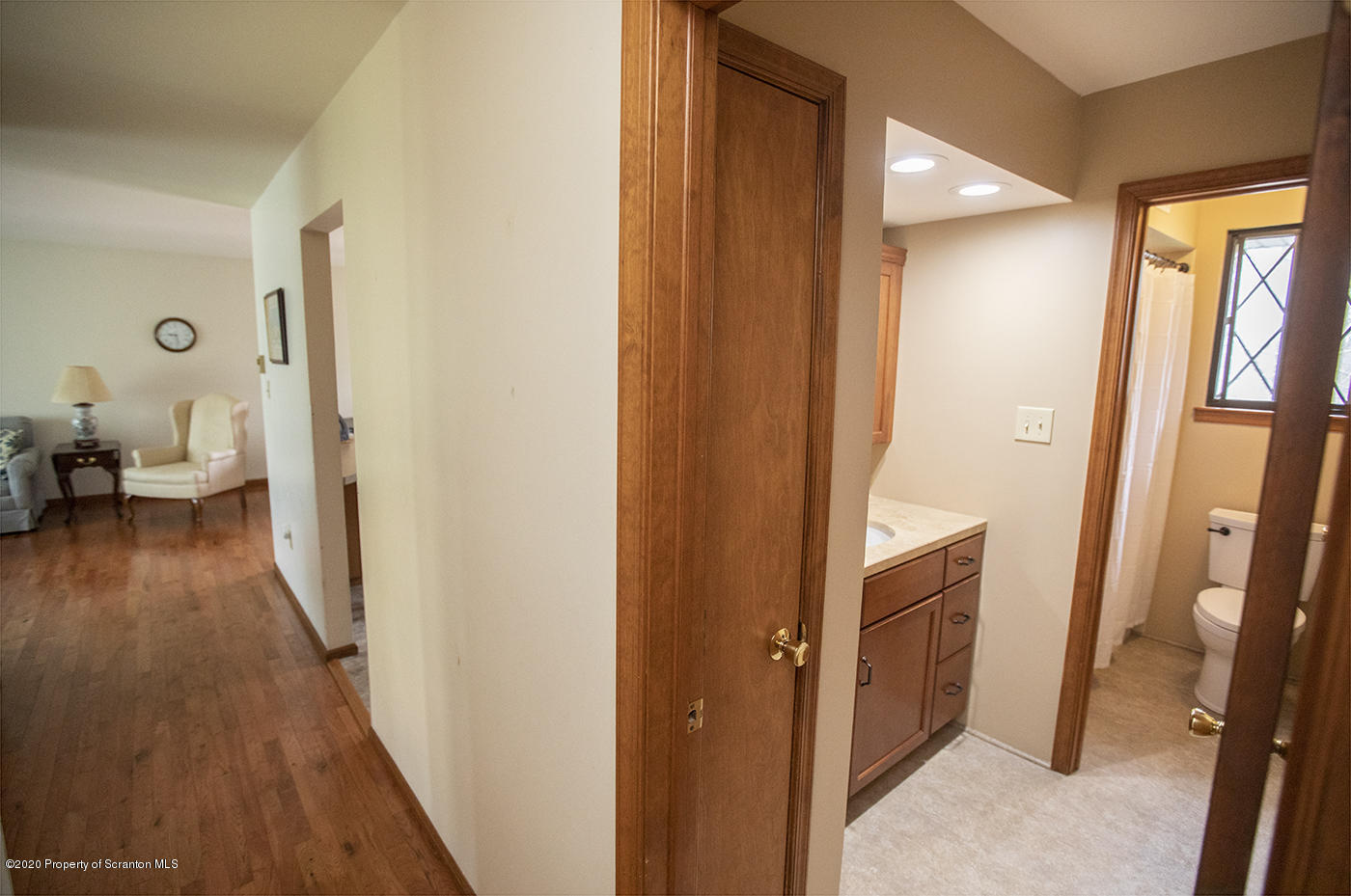 1420 Charles Road Lake Ariel, PA 18436 - Photo 16 of 47 a view of a hallway with wooden floor and furniture