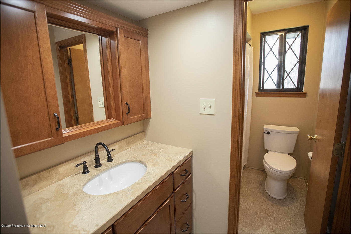 1420 Charles Road Lake Ariel, PA 18436 - Photo 17 of 47 a bathroom with a sink vanity granite and toilet