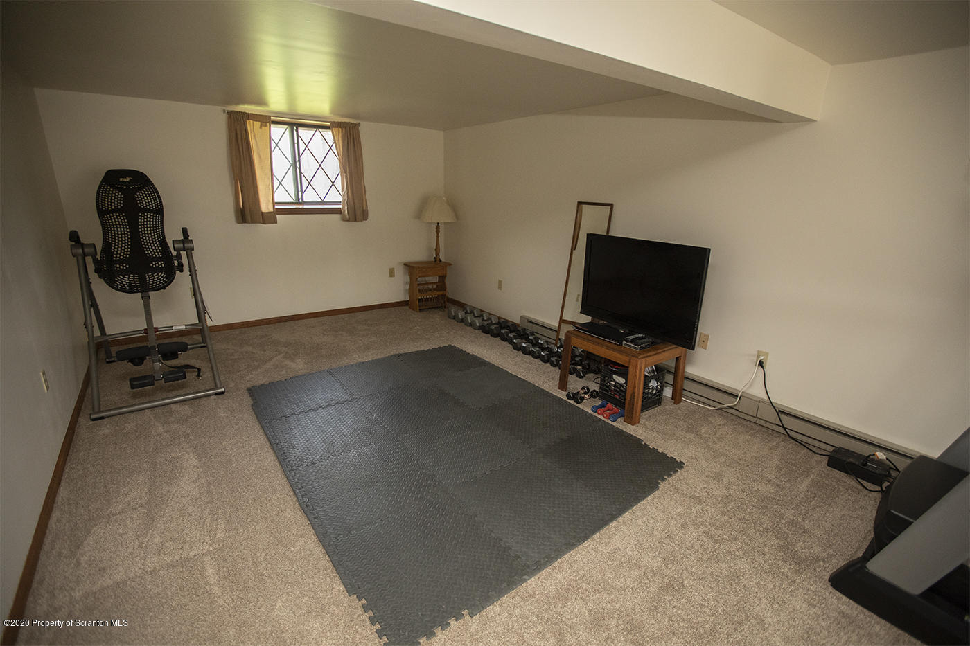 1420 Charles Road Lake Ariel, PA 18436 - Photo 32 of 47 a view of a room with gym equipment and a window