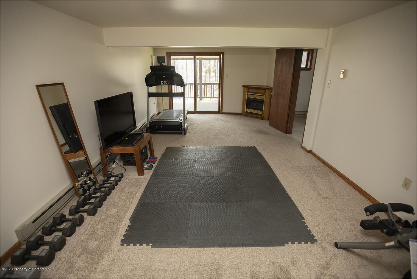 1420 Charles Road Lake Ariel, PA 18436 - Photo 33 of 47 a living room with furniture and a flat screen tv