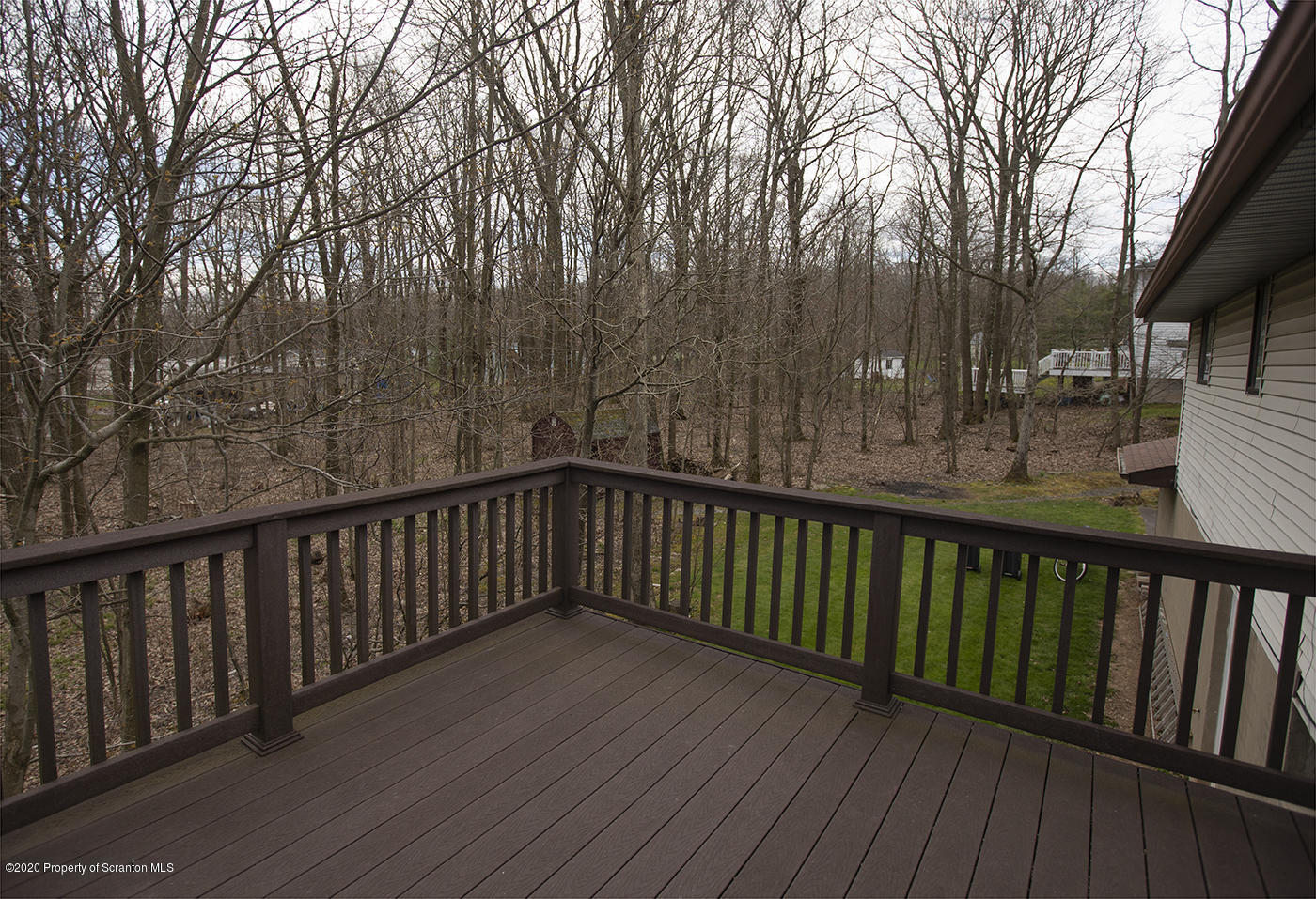 1420 Charles Road Lake Ariel, PA 18436 - Photo 43 of 47 a balcony with wooden floor and fence