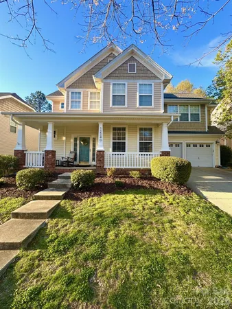 a front view of a house with swimming pool