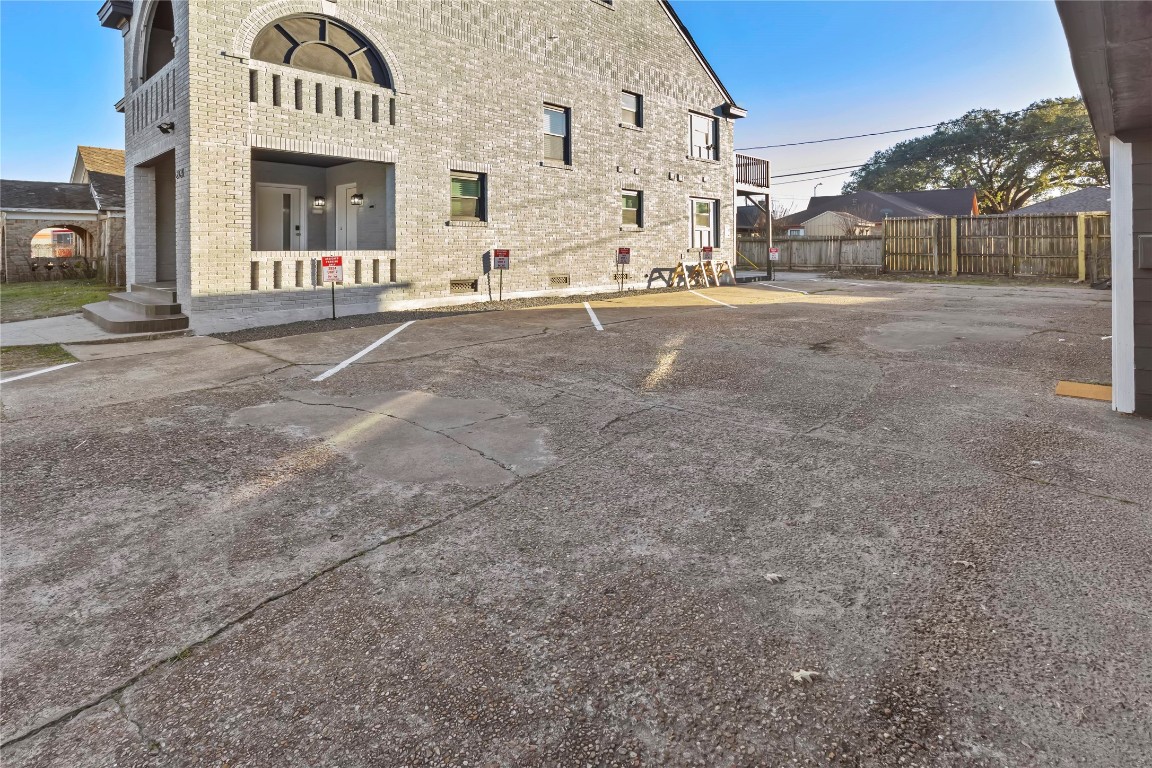 2824 Blodgett Street, Unit 2 Houston, TX 77004 - Photo 3 of 25 front view of a building with a street