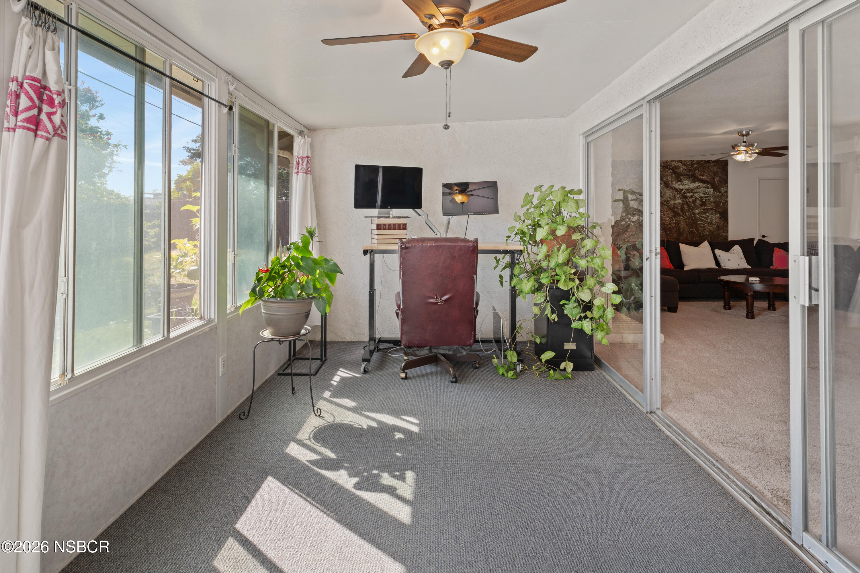 4220 Constellation Road Lompoc, CA 93436 - Photo 7 of 22 a room with furniture and a potted plant