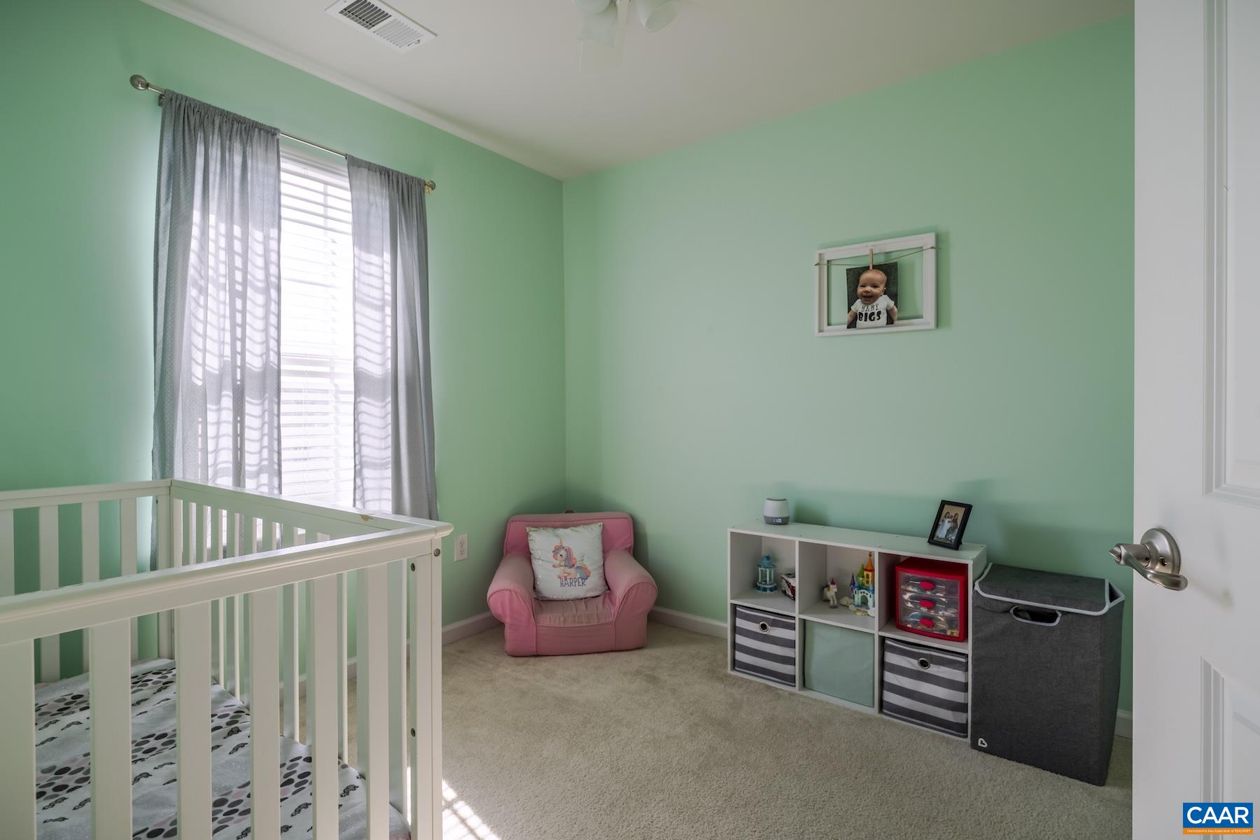2052 Elm Tree Court Charlottesville, VA 22911 - Photo 17 of 26 a bedroom with furniture and a window