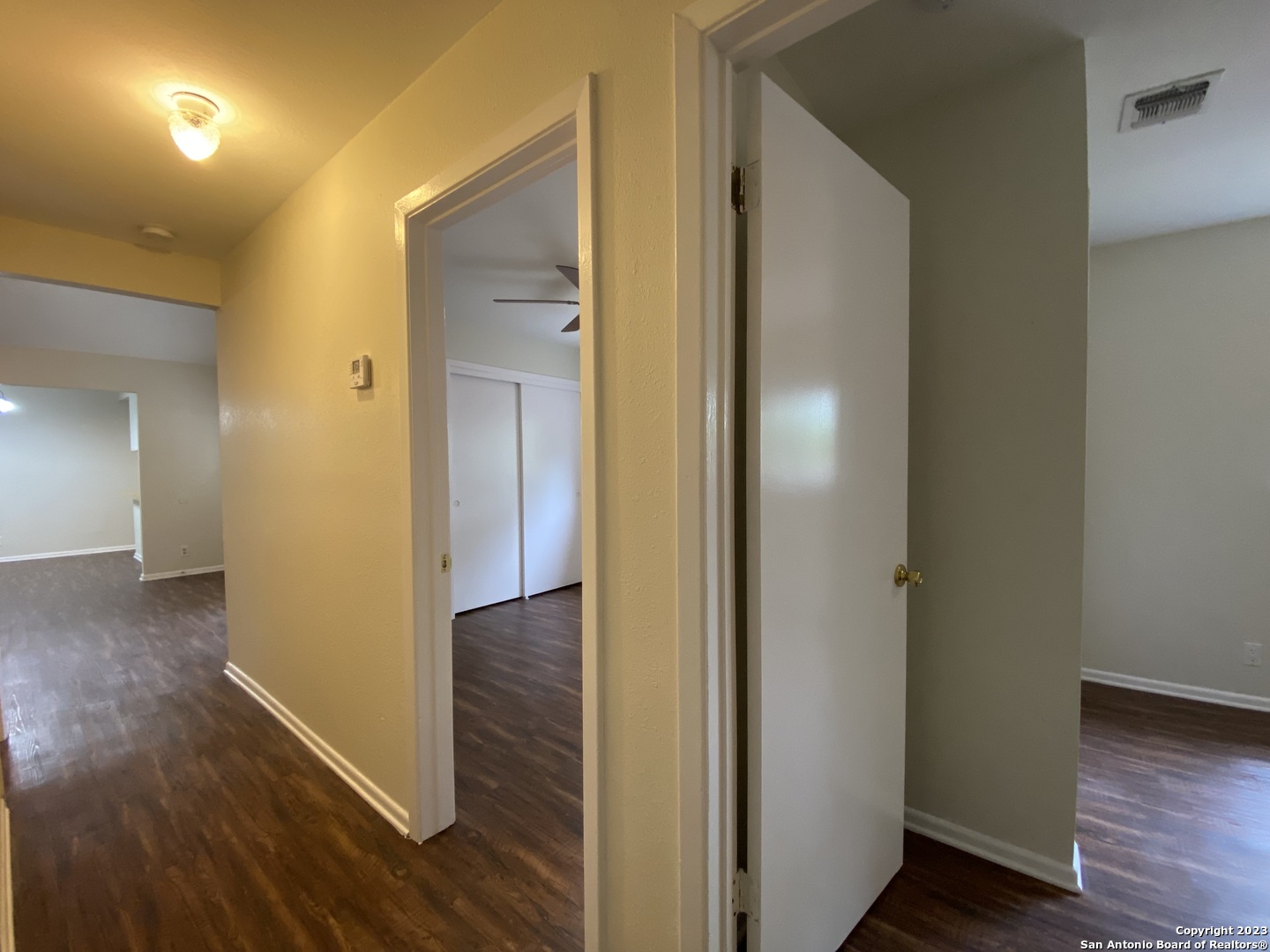 7214 Rimwood Street Live Oak, TX 78233 - Photo 11 of 24 a view of hallway with wooden floor