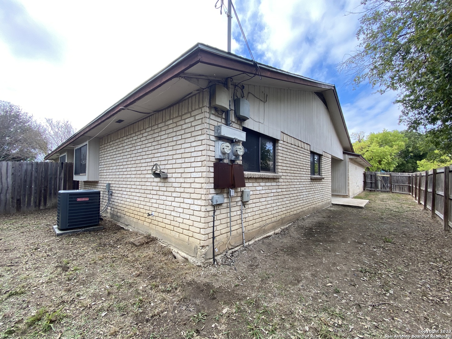 7214 Rimwood Street Live Oak, TX 78233 - Photo 23 of 24 a front view of a house with a yard