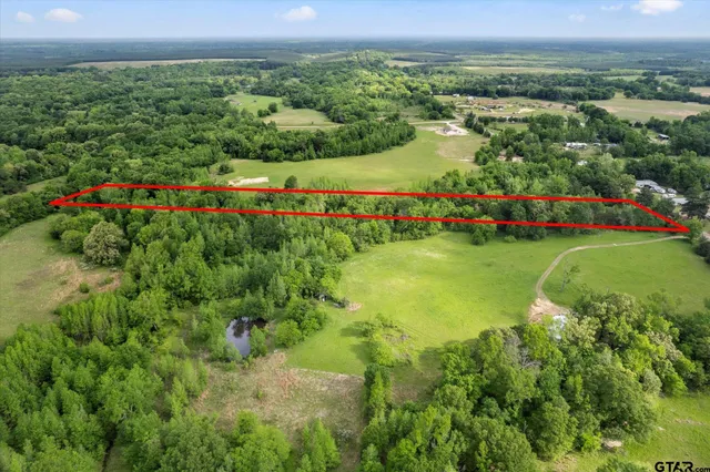 a view of lake with green space