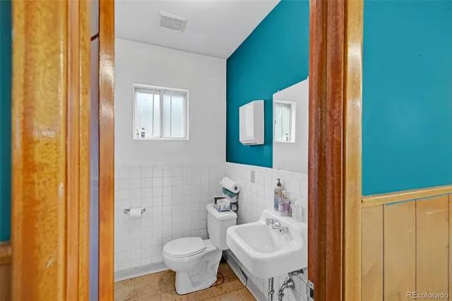 a view of an empty room with furniture