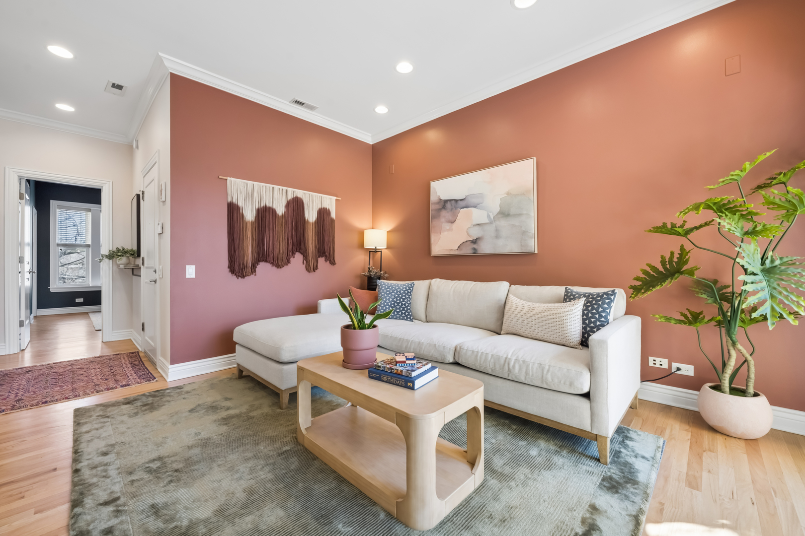 2547 North Clark Street, Unit 2N Chicago, IL 60614 - Photo 3 of 25 a living room with furniture and a potted plant