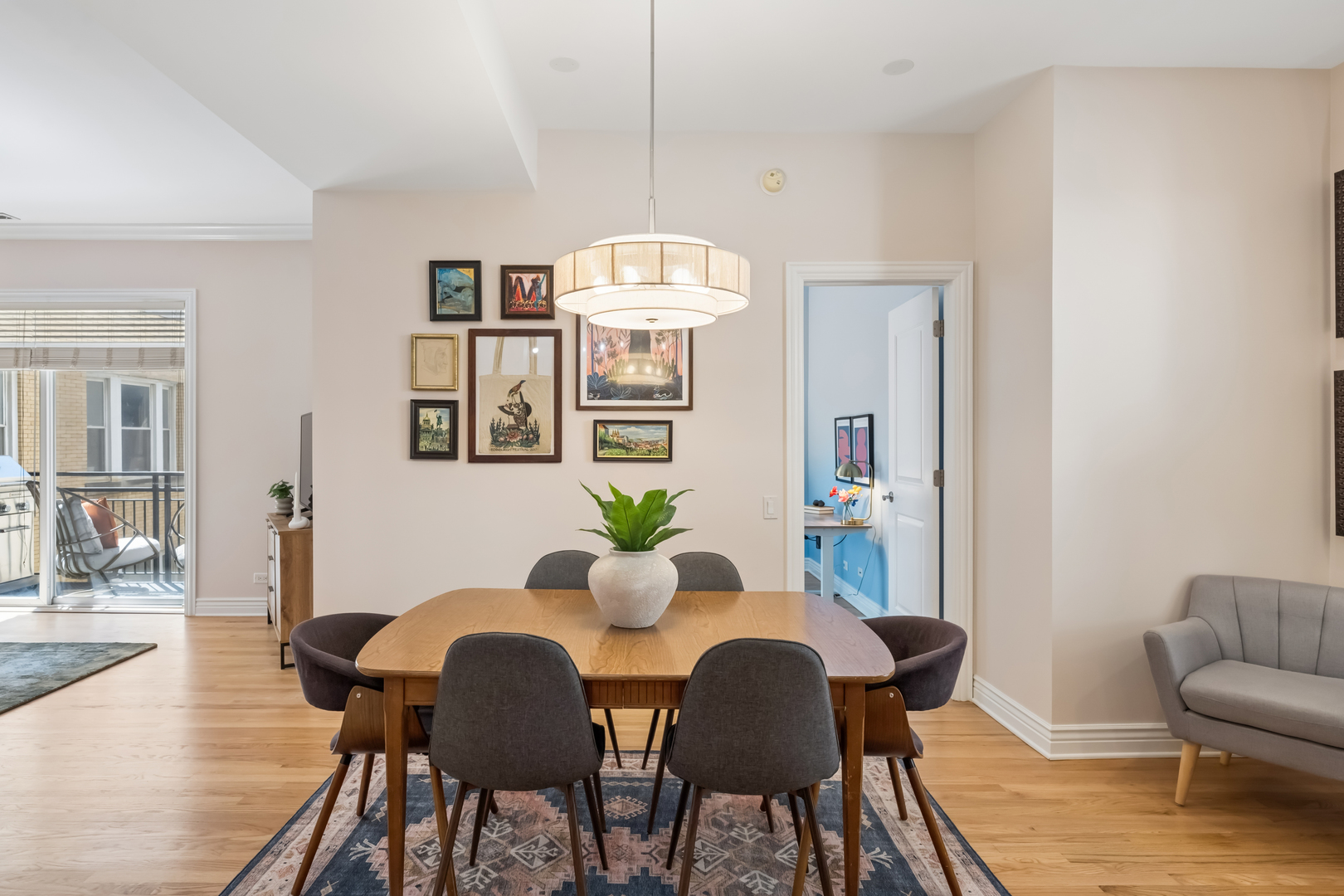 2547 North Clark Street, Unit 2N Chicago, IL 60614 - Photo 8 of 25 a dining room with furniture and wooden floor