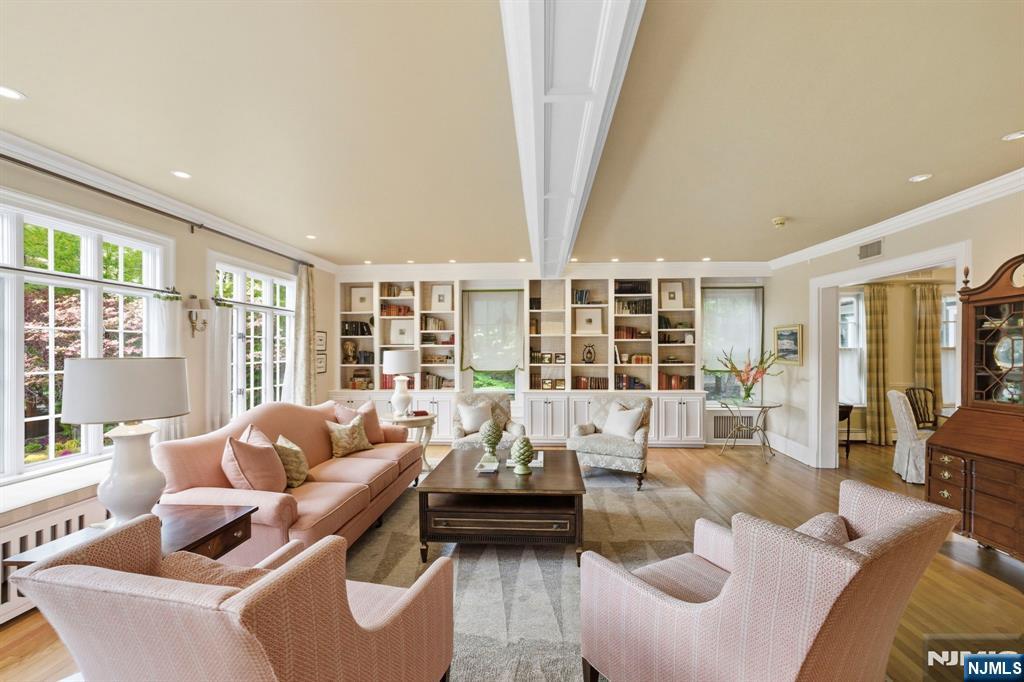 203 Heights Road Ridgewood, NJ 07450 - Photo 13 of 41 a living room with furniture and floor to ceiling windows