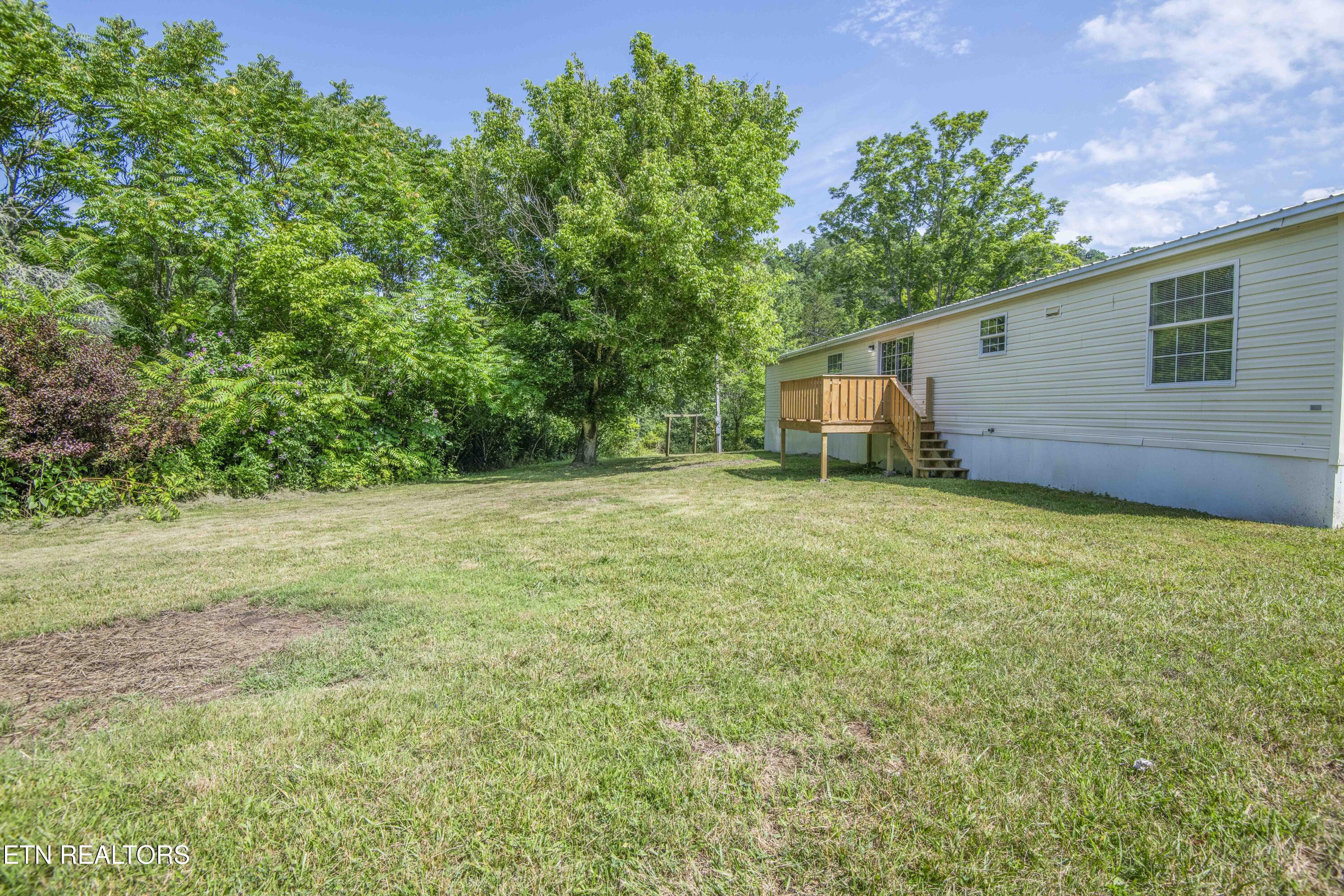 1587 Lower Caney Valley Road Tazewell, TN 37879 - Photo 32 of 42 yard 10_1