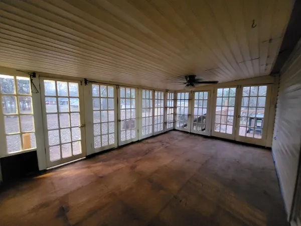 an empty room with windows