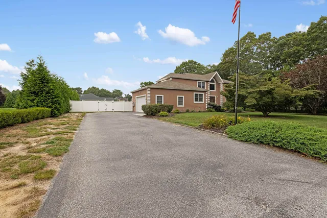 a view of house with outdoor space and street view