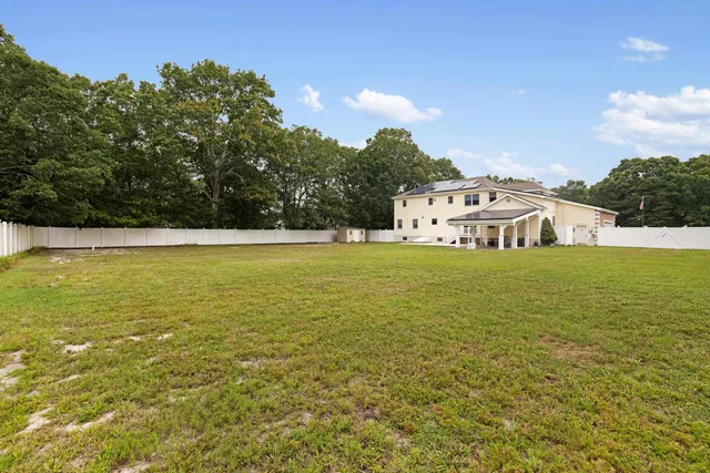 a white house with a ocean view