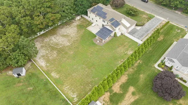 a view of swimming pool with a yard