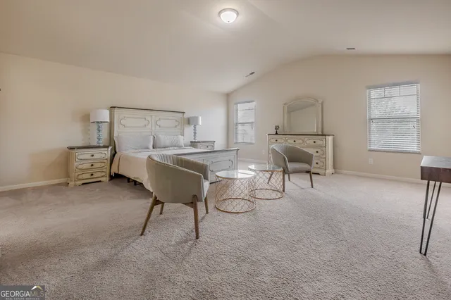 a bed room with a bed furniture and a window