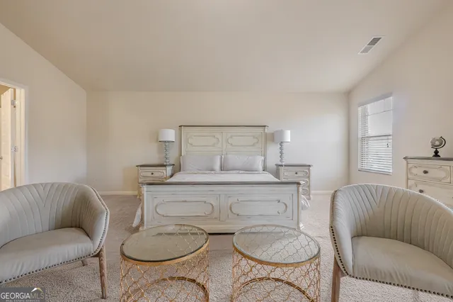 a living room with furniture and a couch